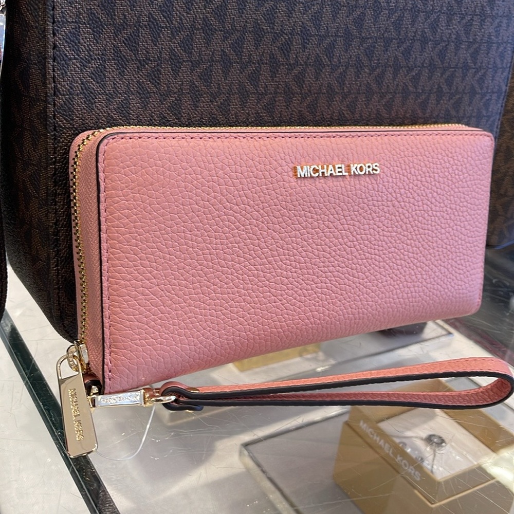 MICHAEL KORS
Leather Continental Wristlet Phone Case Wallet 
Primrose 
NWT - Picture 15 of 16